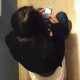 A daring, but lucky cameraman records an unsuspecting girl pissing and taking a shit while sitting on a toilet in public restroom stall. Poop sounds are very subtle, but we see her finished product when she leans forward to wipe.